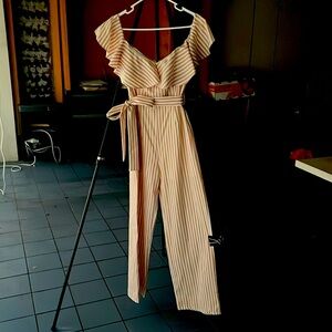Fun flirty striped jumpsuit. Never worn. New with tags.